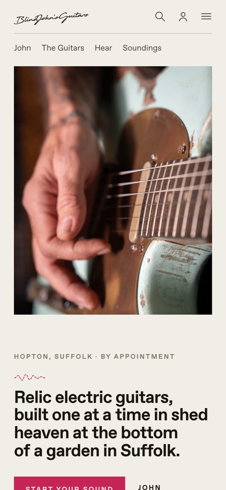 The Blind John's Guitars homepage on a phone, with the line about shed heaven at the bottom of a garden in Suffolk